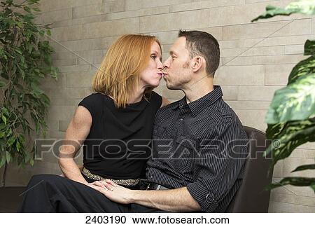 Stock Image - Portrait of a married couple, wife with a disability; Edmonton, Alberta, Canada. Fotosearch