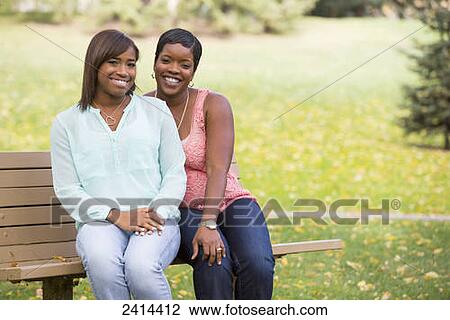 Portrait of a mother and daughter in a park; Edmonton, Alberta, Canada View Large Photo Image Stock Image - Portrait of a mother and daughter in a park; Edmonton, Alberta, Canada. Fotosearch