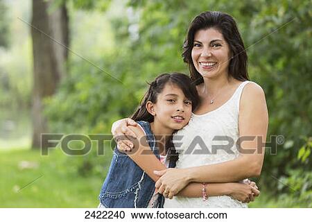 Portrait of a mother and daughter in a park; Edmonton, Alberta, Canada View Large Photo Image Stock Image - Portrait of a mother and daughter in a park; Edmonton, Alberta, Canada. Fotosearch