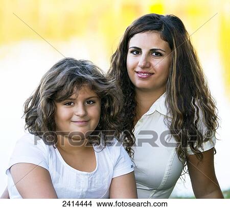 Portrait of a mother and daughter; Edmonton, Alberta, Canada View Large Photo Image Picture - Portrait of a mother and daughter; Edmonton, Alberta, Canada. Fotosearch