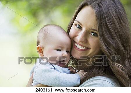 Portrait of a mother and her infant daughter; Edmonton, Alberta, Canada View Large Photo Image Stock Image - Portrait of a mother and her infant daughter; Edmonton, Alberta, Canada. Fotosearch