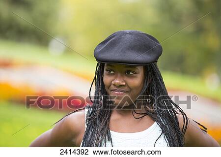 Portrait of a teenage girl in a park; Edmonton, Alberta, Canada View Large Photo Image Stock Image - Portrait of a teenage girl in a park; Edmonton, Alberta, Canada. Fotosearch