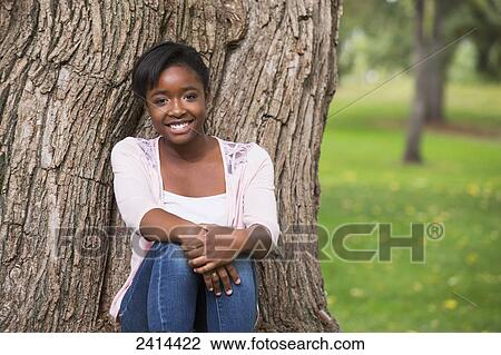 Portrait of a teenage girl in a park; Edmonton, Alberta, Canada View Large Photo Image Stock Image - Portrait of a teenage girl in a park; Edmonton, Alberta, Canada. Fotosearch