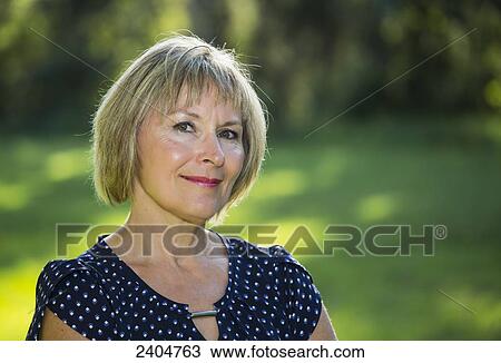 Portrait of a woman; Edmonton, Alberta, Canada View Large Photo Image Stock Image - Portrait of a woman; Edmonton, Alberta, Canada. Fotosearch