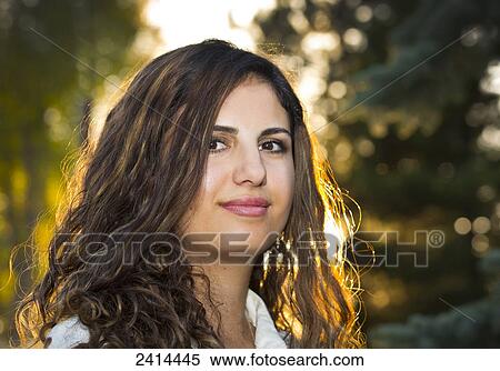 Portrait of a woman in a park; Edmonton, Alberta, Canada View Large Photo Image Stock Photography - Portrait of a woman in a park; Edmonton, Alberta, Canada. Fotosearch