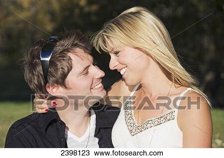 Stock Image - Portrait of a young couple in love; Edmonton, Alberta, Canada. Fotosearch