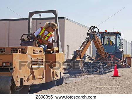 Pothole work crew repairing parking lot; Edmonton, Alberta, Canada View Large Photo Image Stock Photograph - Pothole work crew repairing parking lot; Edmonton, Alberta, Canada. Fotosearch