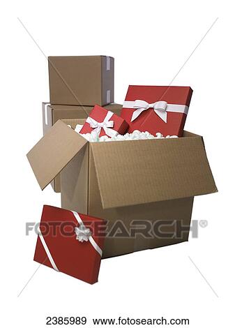 Red boxes with white ribbon packed in shipping boxes View Large Photo Image Stock Photo - Red boxes with white ribbon packed in shipping boxes. Fotosearch
