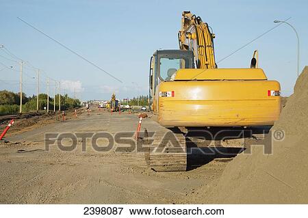 Road construction and heavy equipment; Edmonton, Alberta, Canada View Large Photo Image Stock Photo - Road construction and heavy equipment; Edmonton, Alberta, Canada. Fotosearch