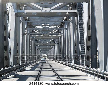 Stock Image - Road/rail bridge crossing Amu Darya (Oxus) river, near Turtkul, Kizilkum desert; Khwarezm region, Uzbekistan. Fotosearch