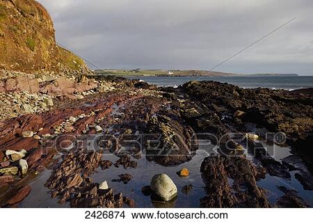 Picture - Roches Point Lighthouse from Myrtleville; County Cork, Ireland. Fotosearch