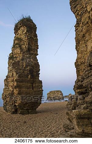 Rock columns at the water's edge along the coast; South Shields, Tyne and Wear, England View Large Photo Image Stock Photography - Rock columns at the water's edge along the coast; South Shields, Tyne and Wear, England. Fotosearch