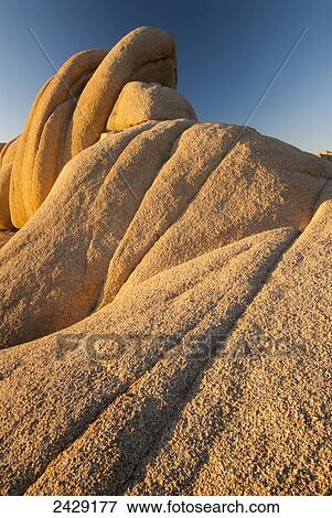 Rock formation at first light, Joshua Tree National Park; California, United States of America View Large Photo Image Stock Photo - Rock formation at first light, Joshua Tree National Park; California, United States of America. Fotosearch