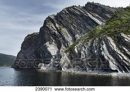 Rugged cliffs at Norris Point; Newfoundland and Labrador, Canada View Large Photo Image Stock Image - Rugged cliffs at Norris Point; Newfoundland and Labrador, Canada. Fotosearch
