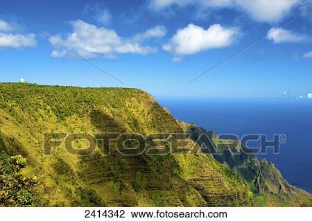 Rugged green cliffs along the coast; Kauai, Hawaii, United States of America View Large Photo Image Stock Image - Rugged green cliffs along the coast; Kauai, Hawaii, United States of America. Fotosearch