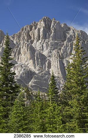Stock Photography - Rugged rock face of the Canadian rocky mountains; Banff, Alberta, Canada. Fotosearch