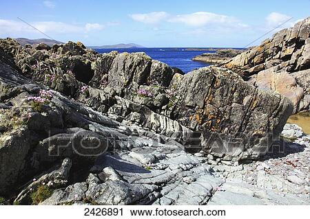 Rugged rocks on the coast, near Allihies; County Cork, Ireland View Large Photo Image Stock Image - Rugged rocks on the coast, near Allihies; County Cork, Ireland. Fotosearch