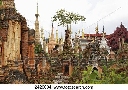 Ruined pagodas at Shwe Inn Thein Paya above Inthein on Inle Lake; Myanmar View Large Photo Image Picture - Ruined pagodas at Shwe Inn Thein Paya above Inthein on Inle Lake; Myanmar. Fotosearch