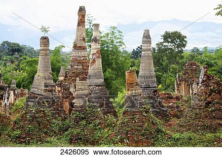 Ruined pagodas at Shwe Inn Thein Paya above Inthein on Inle Lake; Myanmar View Large Photo Image Stock Photography - Ruined pagodas at Shwe Inn Thein Paya above Inthein on Inle Lake; Myanmar. Fotosearch