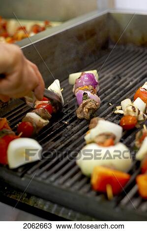 Shish Kabobs Cooking On A Grill View Large Photo Image Stock Image - Shish Kabobs Cooking On A Grill. Fotosearch
