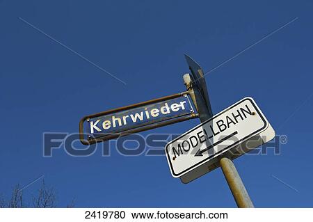 Signs for destinations and street names against a blue sky; Hamburg, Germany View Large Photo Image Stock Image - Signs for destinations and street names against a blue sky; Hamburg, Germany. Fotosearch