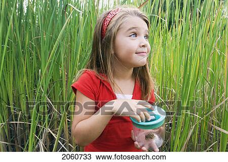 Six Year Old Girl In Wetland, With Frog In Collecting Jar, Winnipeg, Canada View Large Photo Image Stock Image - Six Year Old Girl In Wetland, With Frog In Collecting Jar, Winnipeg, Canada. Fotosearch