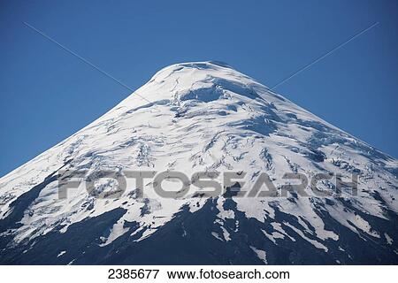 Snowcapped mountain peak; Puerto Varas, Los Lagos, Chile View Large Photo Image Stock Photo - Snowcapped mountain peak; Puerto Varas, Los Lagos, Chile. Fotosearch