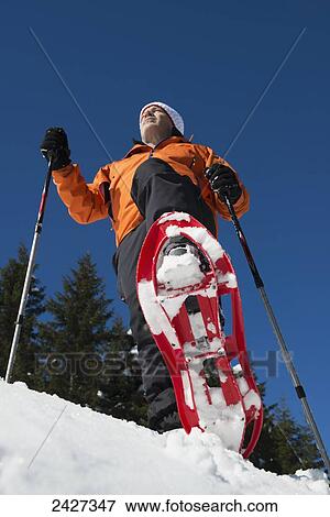 Snowshoeing in the Swiss Alps; San Bernardino, Grisons, Switzerland View Large Photo Image Stock Photo - Snowshoeing in the Swiss Alps; San Bernardino, Grisons, Switzerland . Fotosearch