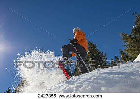 Snowshoeing in the Swiss Alps; San Bernardino, Grisons, Switzerland View Large Photo Image Stock Photography - Snowshoeing in the Swiss Alps; San Bernardino, Grisons, Switzerland . Fotosearch