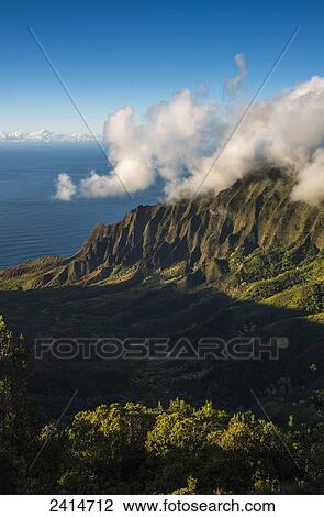 Spectacular views are found at the end of the road from Puu O Kila Overlook, Na Pali Coast; Hawaii, United States of America View Large Photo Image Stock Image - Spectacular views are found at the end of the road from Puu O Kila Overlook, Na Pali Coast; Hawaii, United States of America. Fotosearch