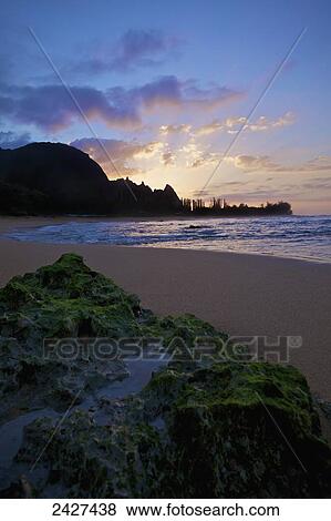 Stock Photo - Sunrise at Tunnels Beach; Kauai, Hawaii, United States of America. Fotosearch