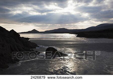 Sunset at White Strand, near Castlecove; County Kerry, Ireland View Large Photo Image Stock Photo - Sunset at White Strand, near Castlecove; County Kerry, Ireland. Fotosearch