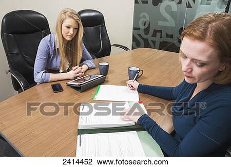 Supervisor teaching intern about accounting practises; Edmonton, Alberta, Canada View Large Photo Image Stock Image - Supervisor teaching intern about accounting practises; Edmonton, Alberta, Canada. Fotosearch