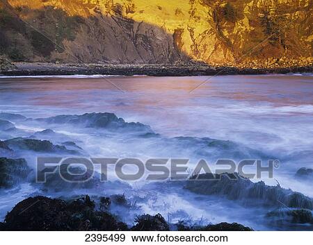 Stock Photo - Surf breaks at Cape Arago; Charleston, Oregon, United States of America. Fotosearch