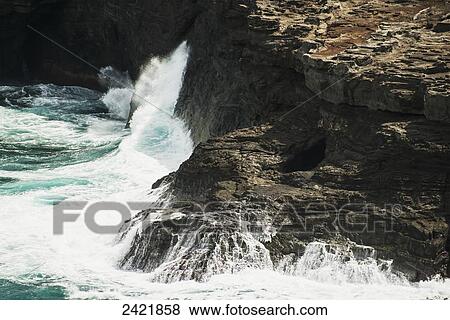 Surf breaks on the rocks; Kilauea, Kauai, Hawaii, United States of America View Large Photo Image Stock Photo - Surf breaks on the rocks; Kilauea, Kauai, Hawaii, United States of America. Fotosearch