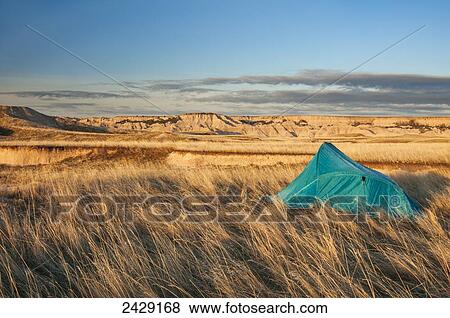 Tent at camp site in Sage Creek Wilderness Area, Badlands National Park; South Dakota, United States of America View Large Photo Image Stock Photo - Tent at camp site in Sage Creek Wilderness Area, Badlands National Park; South Dakota, United States of America. Fotosearch