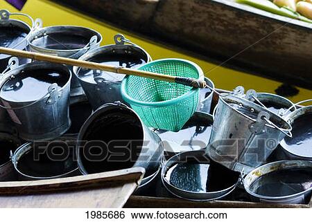 Stock Photograph - Thailand, Bangkok, Damnoen Saduak Floating Market, Cooking Wares.. Fotosearch