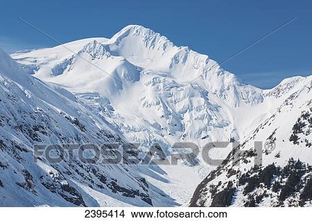 The Chugach mountains with fresh snow, Chugach National Forest; Alaska, United States of America View Large Photo Image Picture - The Chugach mountains with fresh snow, Chugach National Forest; Alaska, United States of America. Fotosearch