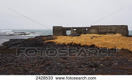 The remains of a stone building on a beach along the south coast of Iceland; Iceland View Large Photo Image Stock Image - The remains of a stone building on a beach along the south coast of Iceland; Iceland. Fotosearch