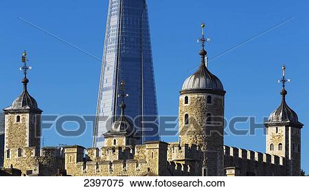 The Shard skyscraper seen behind Tower of London; London, England View Large Photo Image Stock Photography - The Shard skyscraper seen behind Tower of London; London, England. Fotosearch