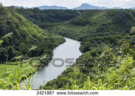 The Wailua River flows to the Pacific ocean; Kauai, Hawaii, United States of America View Large Photo Image Stock Photo - The Wailua River flows to the Pacific ocean; Kauai, Hawaii, United States of America. Fotosearch