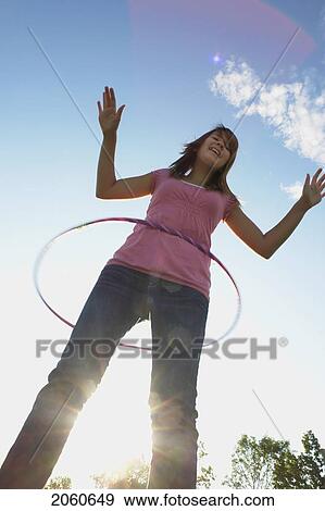 Thirteen Year Old Girl With Hula Hoop, Winnipeg, Canada View Large Photo Image Stock Photo - Thirteen Year Old Girl With Hula Hoop, Winnipeg, Canada. Fotosearch