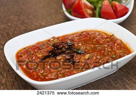 Tomato based side dish in a local restaurant; Urgup, Cappadocia, Turkey View Large Photo Image Stock Photography - Tomato based side dish in a local restaurant; Urgup, Cappadocia, Turkey. Fotosearch