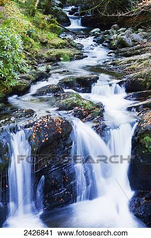 Stock Image - Torc Waterfall; Killarney, County Kerry, Ireland. Fotosearch