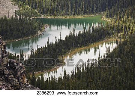Two small alpine lakes viewed from above; British Columbia, Canada View Large Photo Image Stock Image - Two small alpine lakes viewed from above; British Columbia, Canada. Fotosearch