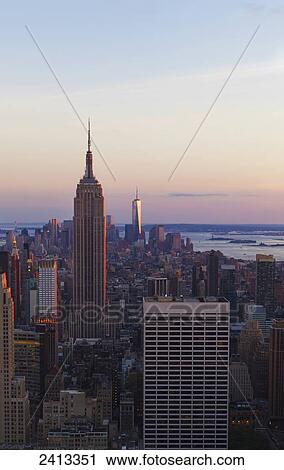 View of the Empire State Building and Manhattan from the Top of the Rock Observation Tower at the Rockefeller Center; New York City, New York, United States of America View Large Photo Image Stock Image - View of the Empire State Building and Manhattan from the Top of the Rock Observation Tower at the Rockefeller Center; New York City, New York, United States of America. Fotosearch