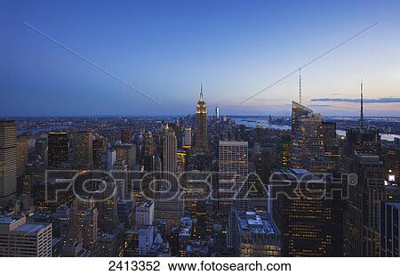 View of the Empire State Building and Manhattan from the Top of the Rock Observation Tower at the Rockefeller Center; New York City, New York, United States of America View Large Photo Image Stock Image - View of the Empire State Building and Manhattan from the Top of the Rock Observation Tower at the Rockefeller Center; New York City, New York, United States of America. Fotosearch