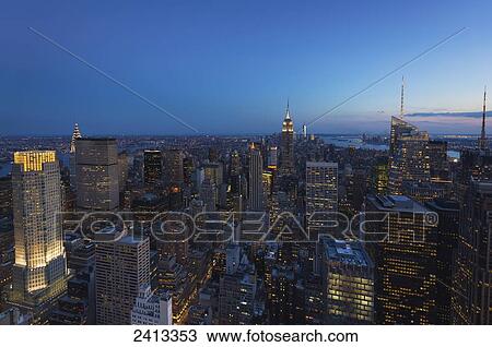 View of the Empire State Building and Manhattan from the Top of the Rock Observation Tower at the Rockefeller Center; New York City, New York, United States of America View Large Photo Image Stock Image - View of the Empire State Building and Manhattan from the Top of the Rock Observation Tower at the Rockefeller Center; New York City, New York, United States of America. Fotosearch
