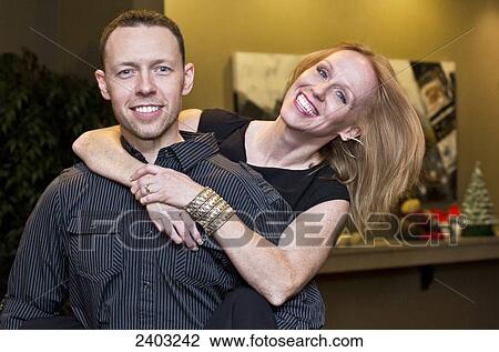 Wife with a disability embracing her husband; Edmonton, Alberta, Canada View Large Photo Image Stock Image - Wife with a disability embracing her husband; Edmonton, Alberta, Canada. Fotosearch