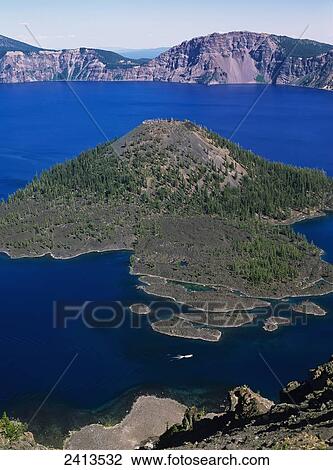 Stock Image - Wizard Island in Crater Lake; Mazama, Oregon, United States of America. Fotosearch